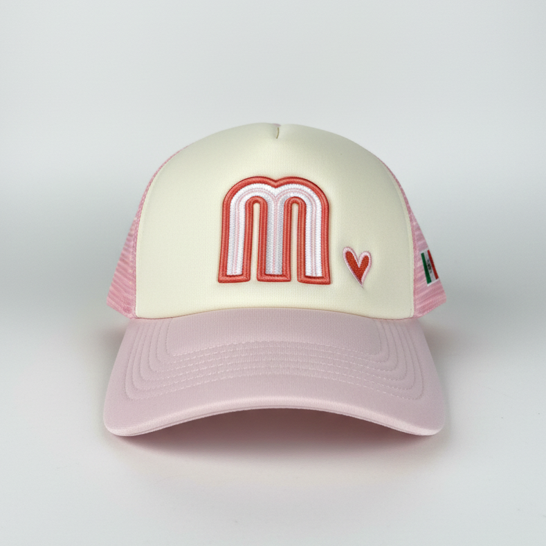 Pink and beige Mexico cap with a logo on a white background